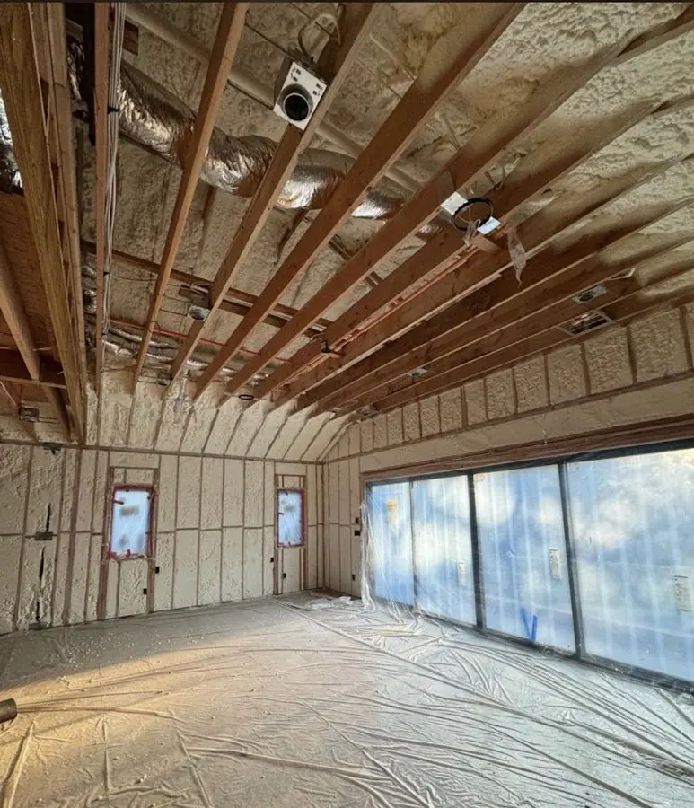 Interior walls and ceiling insulated with spray foam during new construction in Orland Hills
